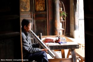 Uomo, Tuanshan, Yunnan, Cina. Autore e Copyright Marco Ramerini